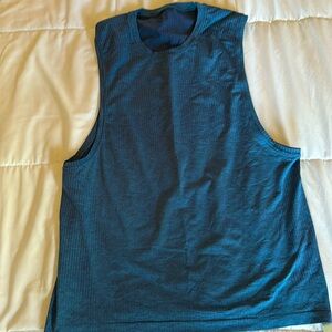 Large sleeveless lululemon workout shirt. Worn once. In perfect condition.